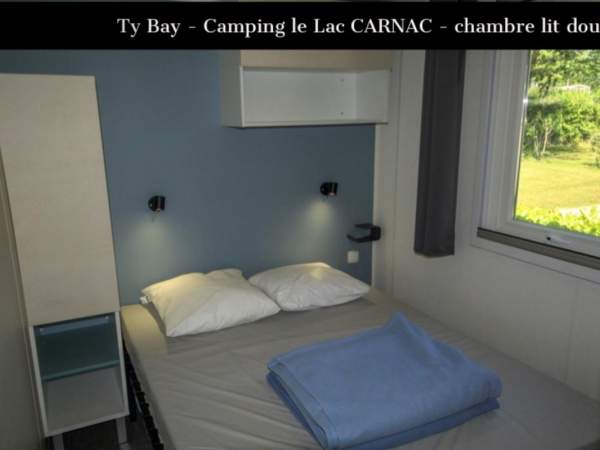 chambre parents avec lit double locatif mobilhome ty bay